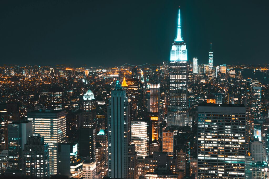 A breathtaking view of New York City's illuminated skyline at night.